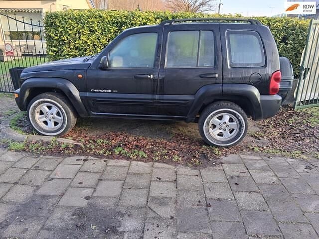 Zwart (metallic) Occasion 2003 Jeep Cherokee SUV | € 1.750 (Super prijs) - Afbeelding 1/4