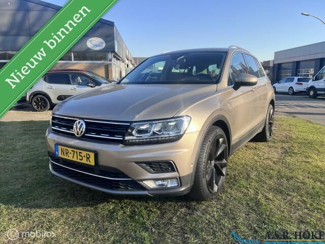 Geel Gebruikt 2017 VW Tiguan Highline SUV | € 22.950 (Eerlijke prijs) - Afbeelding 1/4