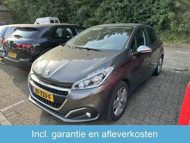 Grijs Gebruikt 2019 Peugeot 208 Signature Sky Hatchback | € 10.950 (Goede deal) - Afbeelding 1/3