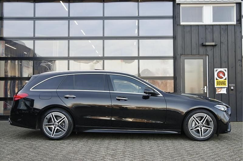 Occasion Mercedes C180 AMG line 2024 Zwart Stationwagen