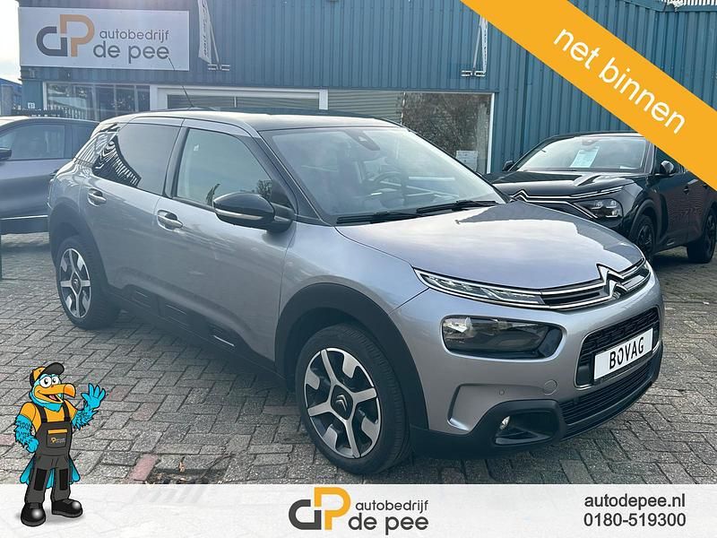 Grijs Gebruikt 2019 Citroën C4 PureTech SUV | € 11.895 (Eerlijke prijs) - Afbeelding 1/4