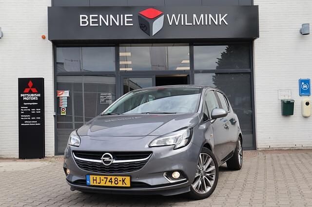 Grijs Gebruikt 2015 Opel Corsa Cosmo Hatchback | € 7.995 (Eerlijke prijs) - Afbeelding 1/4