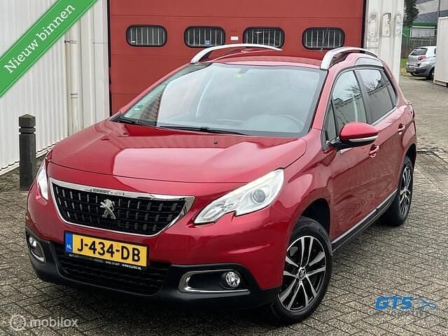 Rood (metallic) Occasion 2016 Peugeot 2008 SUV | € 6.750 (Super prijs) - Afbeelding 1/4