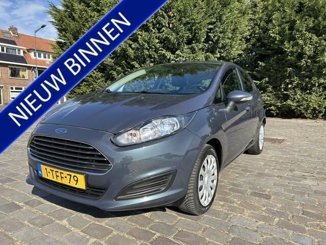 Grijs, metallic lak Gebruikt 2014 Ford Fiesta Style Hatchback | € 4.950 (Eerlijke prijs) - Afbeelding 1/4