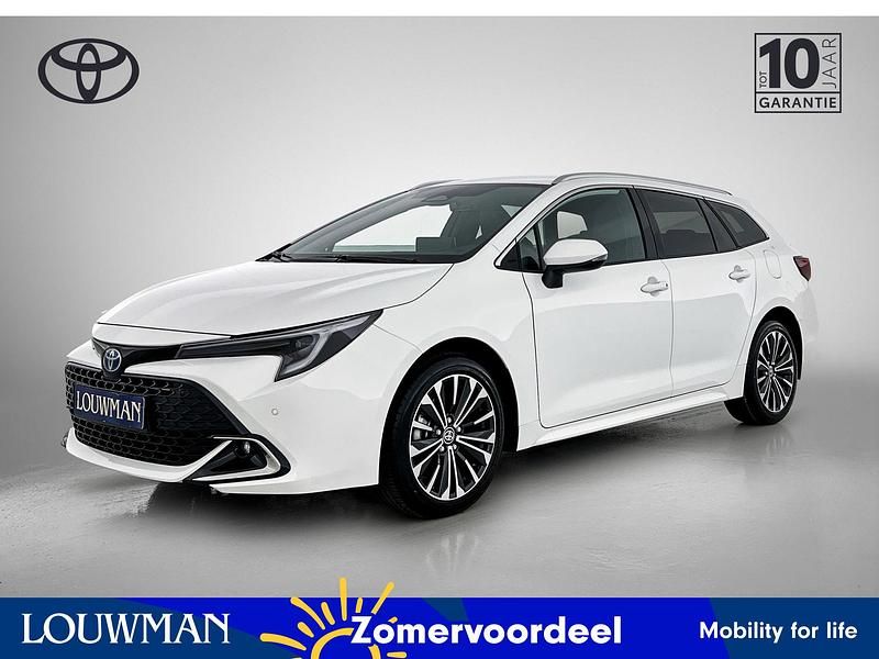 Wit Nieuw 2025 Toyota Corolla Hybrid Stationwagen | € 40.195 - Afbeelding 1/4