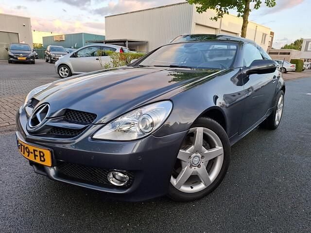 Grijs Gebruikt 2010 Mercedes SLK200 Prestige Cabriolet | € 12.950 (Eerlijke prijs) - Afbeelding 1/4