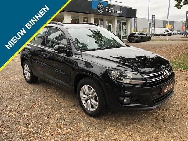 Zwart Gebruikt 2014 VW Tiguan Comfortline SUV | € 10.500 (Goede deal) - Afbeelding 1/4