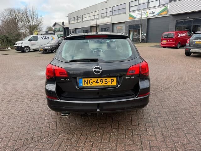 Occasion Opel Astra Design Edition 140 PK (102 kW) 2013 Zwart Stationwagen