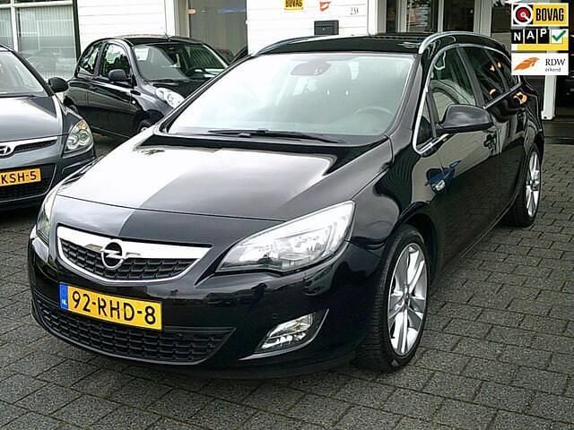 Zwart Gebruikt 2011 Opel Astra Sport Stationwagen | € 4.350 (Iets duurder) - Afbeelding 1/4