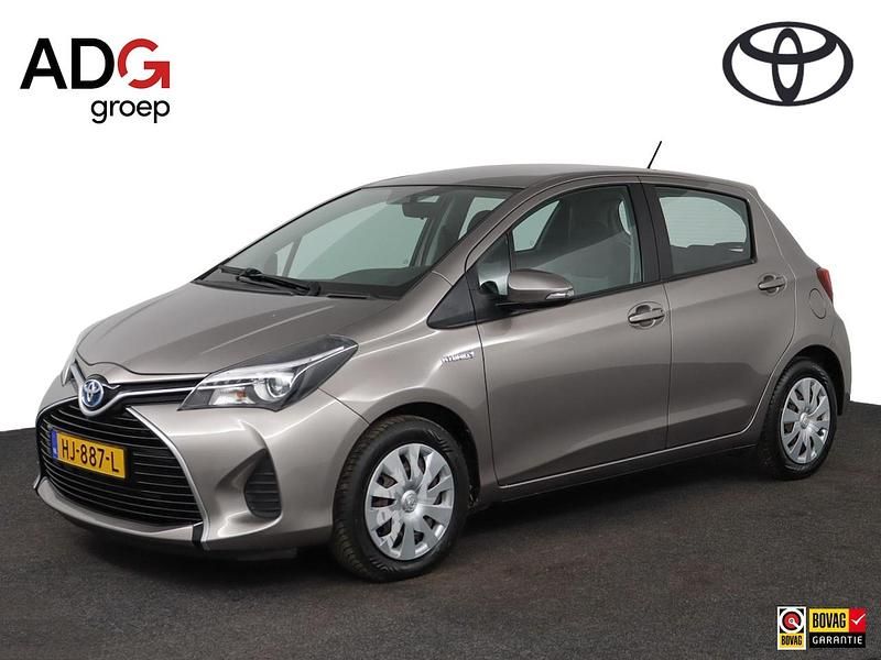 Bruin Gebruikt 2015 Toyota Yaris Hybrid Hatchback | € 14.400 (Eerlijke prijs) - Afbeelding 1/4