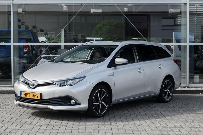 Grijs Gebruikt 2017 Toyota Auris Hybrid Stationwagen | € 17.950 (Eerlijke prijs) - Afbeelding 1/4
