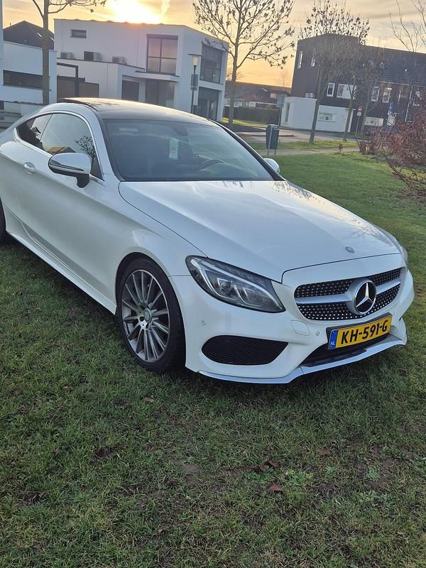 Wit Occasion 2016 Mercedes C180 Ambition Coupé | € 18.900 (Goede deal) - Afbeelding 1/4