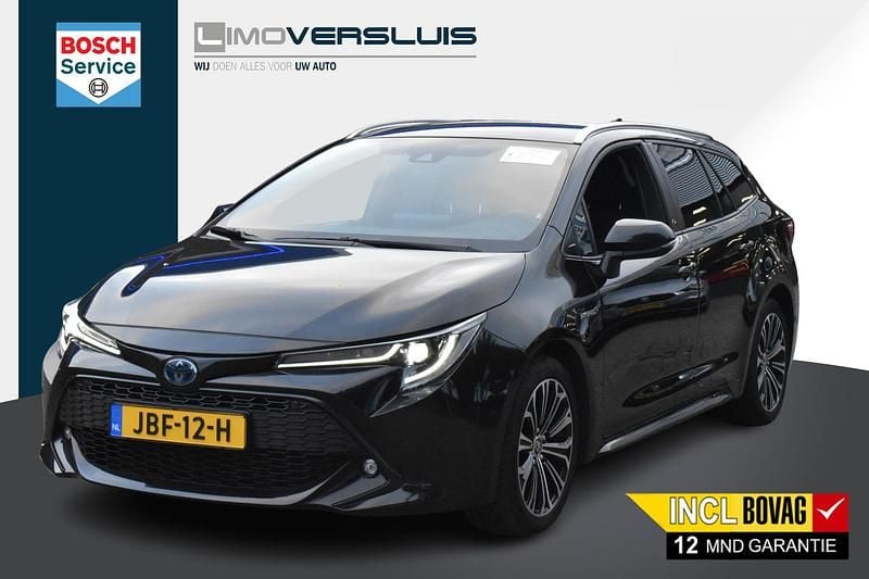 Zwart Gebruikt 2021 Toyota Corolla Stationwagen | € 25.750 (Eerlijke prijs) - Afbeelding 1/4