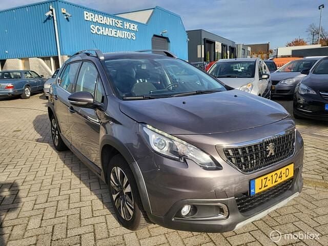 Grijs (metallic) Gebruikt 2016 Peugeot 2008 Allure SUV | € 8.650 (Super prijs) - Afbeelding 1/4