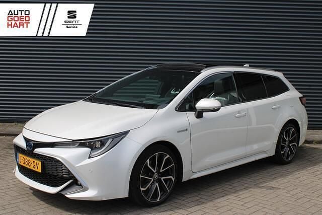 Wit Gebruikt 2020 Toyota Corolla Premium Stationwagen | € 26.895 (Iets duurder) - Afbeelding 1/4