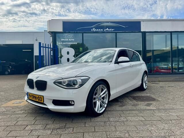 Wit Gebruikt 2014 BMW 116 Sport Line Hatchback | € 11.250 (Eerlijke prijs) - Afbeelding 1/4