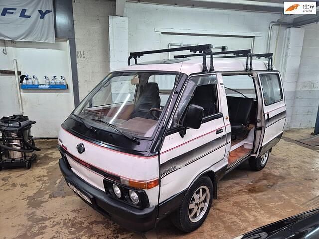 Wit Gebruikt 1986 Nissan Vanette MPV | € 6.950 - Afbeelding 1/4