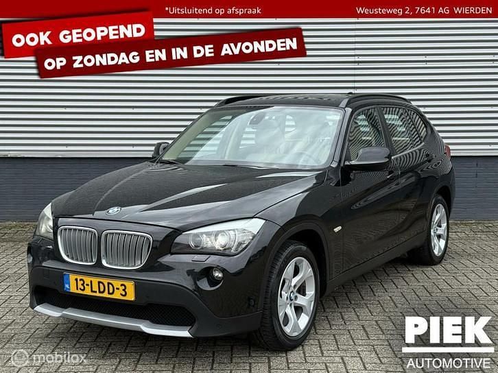 Zwart, metallic lak Gebruikt 2010 BMW X1 Executive SUV | € 7.999 (Eerlijke prijs) - Afbeelding 1/3