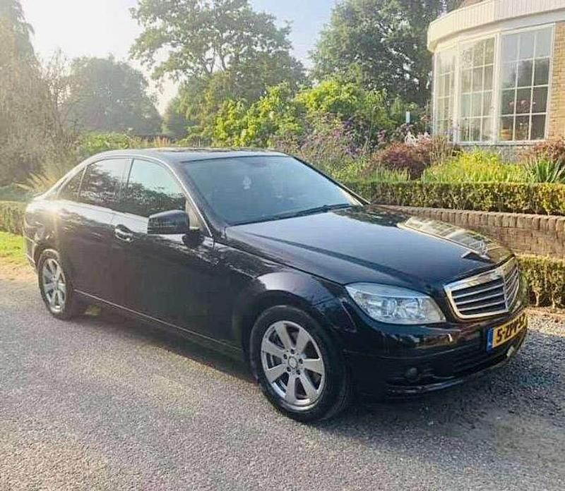 Zwart Occasion 2009 Mercedes C200 Business Sedan | € 4.500 (Eerlijke prijs) - Afbeelding 1/4
