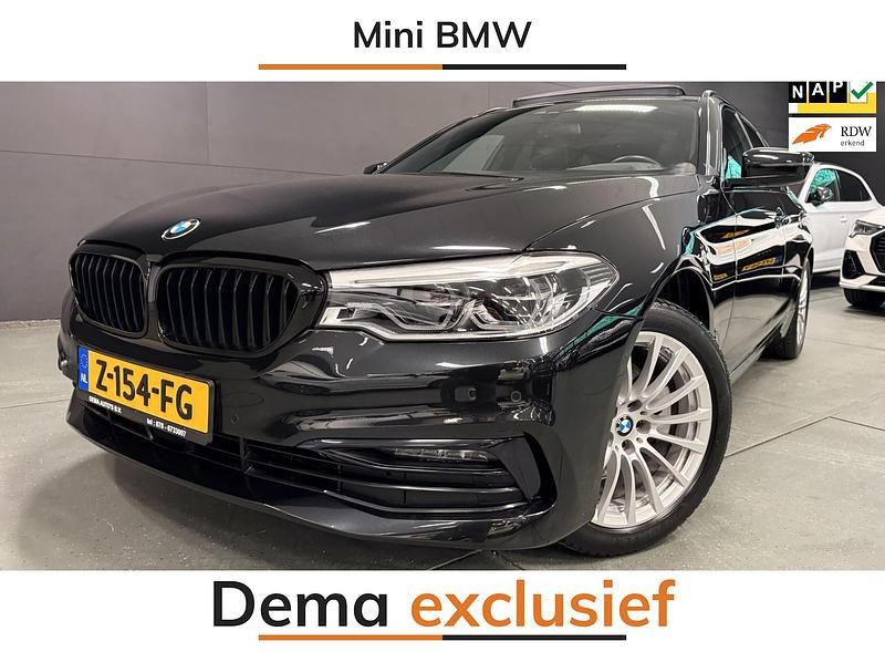 Zwart Gebruikt 2020 BMW 520 Executive Stationwagen | € 35.950 (Eerlijke prijs) - Afbeelding 1/4