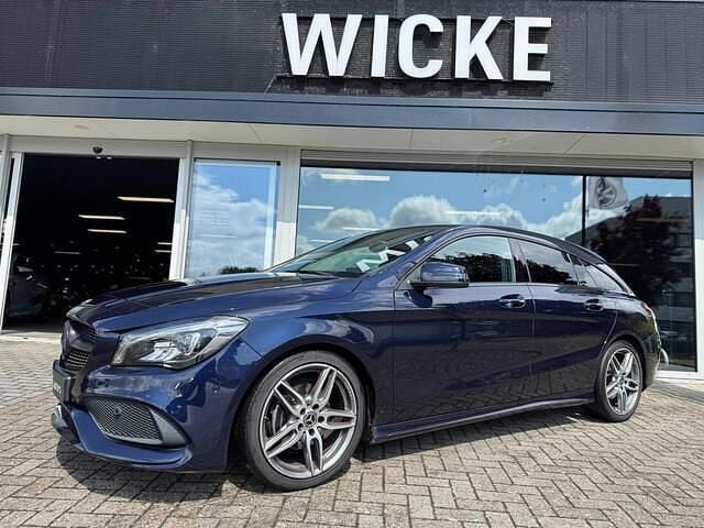 Blauw, metallic lak Gebruikt 2018 Mercedes CLA180 Shooting Brake Business Stationwagen | € 17.400 (Goede deal) - Afbeelding 1/4