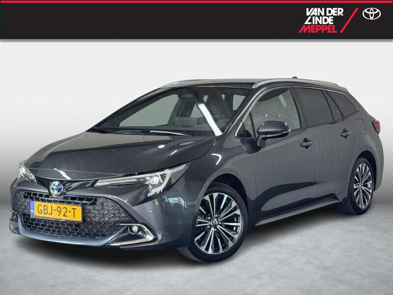 Grijs Gebruikt 2024 Toyota Corolla Hybrid Stationwagen | € 33.450 - Afbeelding 1/4