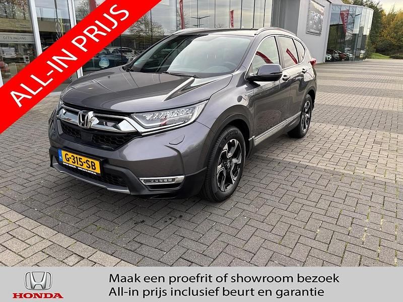 Grijs (metallic) Gebruikt 2019 Honda CR-V Hybrid SUV | € 29.990 - Afbeelding 1/4