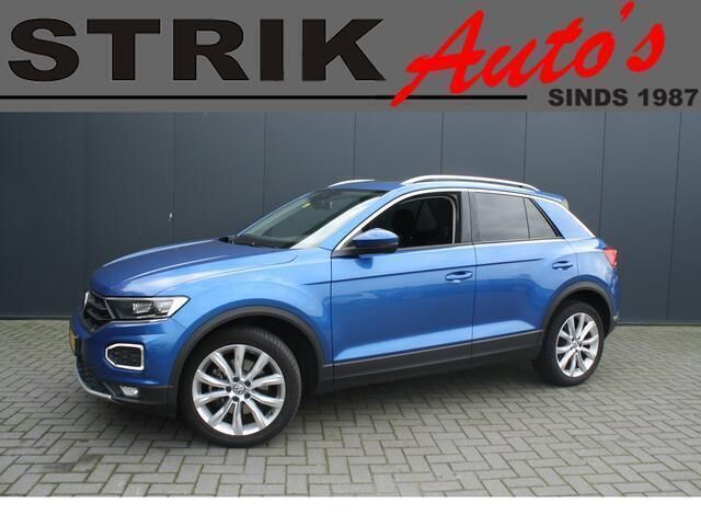Blauw Gebruikt 2019 VW T-Roc Style SUV | € 19.989 (Eerlijke prijs) - Afbeelding 1/4