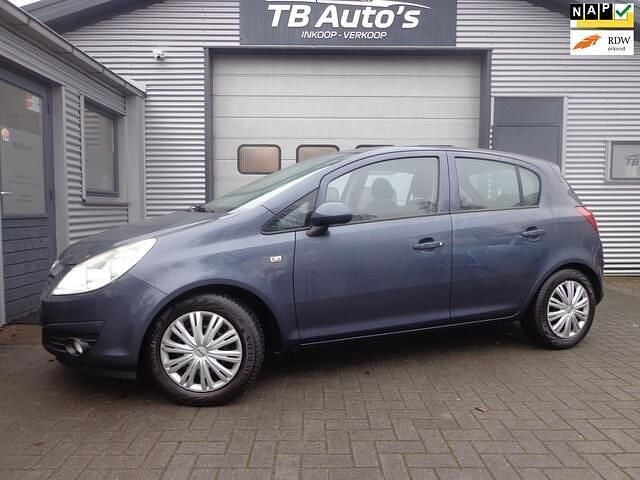 Grijs (metallic) Occasion 2009 Opel Corsa Enjoy Hatchback | € 1.500 (Super prijs) - Afbeelding 1/4