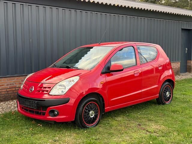 Rood Gebruikt 2011 Nissan Pixo Acenta Hatchback | € 1.950 (Eerlijke prijs) - Afbeelding 1/4