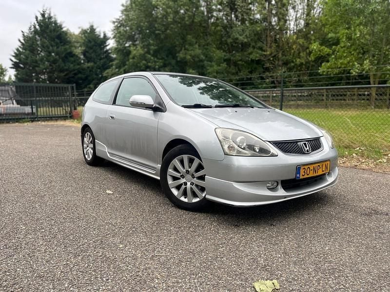 Grijs Gebruikt 2004 Honda Civic Sport Hatchback | € 2.250 (Eerlijke prijs) - Afbeelding 1/4