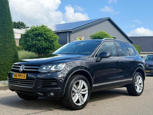 Zwart Gebruikt 2010 VW Touareg Highline SUV | € 8.950 - Afbeelding 1/4