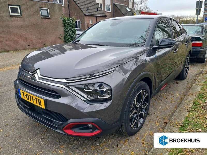 Grijs Gebruikt 2023 Citroën e-C4 Shine SUV | € 19.900 (Goede deal) - Afbeelding 1/4