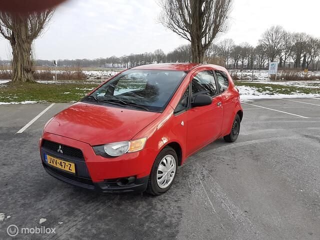 Rood Occasion 2009 Mitsubishi Colt Invite Hatchback | € 2.799 (Goede deal) - Afbeelding 1/4