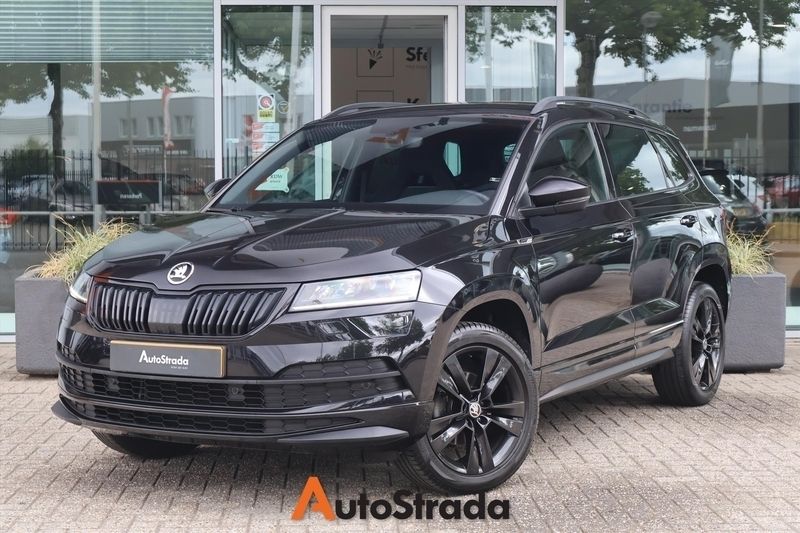 Zwart Gebruikt 2019 Skoda Karoq SportLine SUV | € 24.700 (Eerlijke prijs) - Afbeelding 1/4