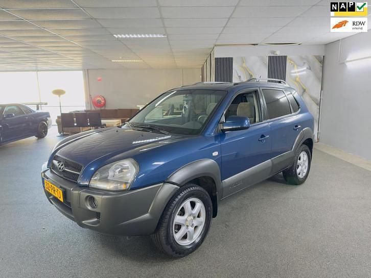 Blauw (metallic) Gebruikt 2004 Hyundai Tucson Dynamiq SUV | € 3.495 (Eerlijke prijs) - Afbeelding 1/4