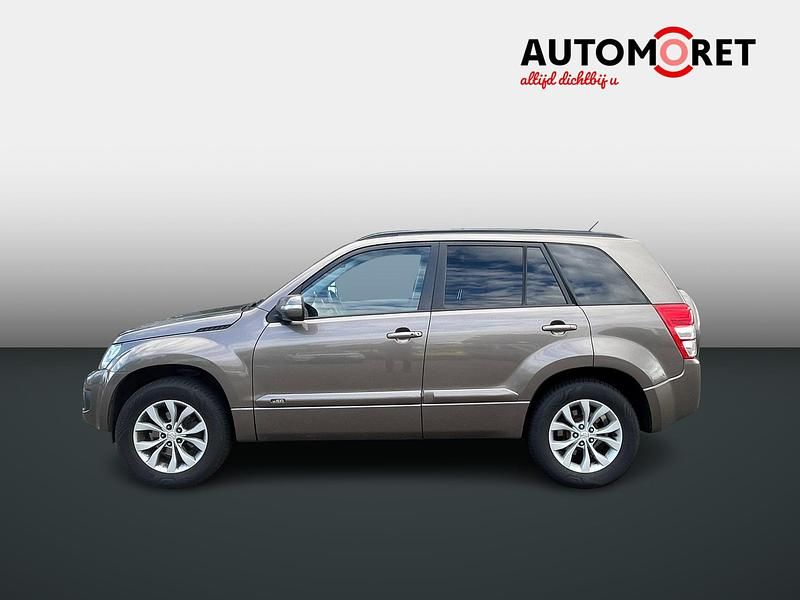 Bruin Gebruikt 2013 Suzuki Grand Vitara Exclusive SUV | € 18.950 - Afbeelding 1/4