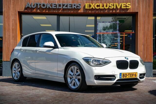 Wit Gebruikt 2012 BMW 118 Sport Line Hatchback | € 7.450 (Eerlijke prijs) - Afbeelding 1/4