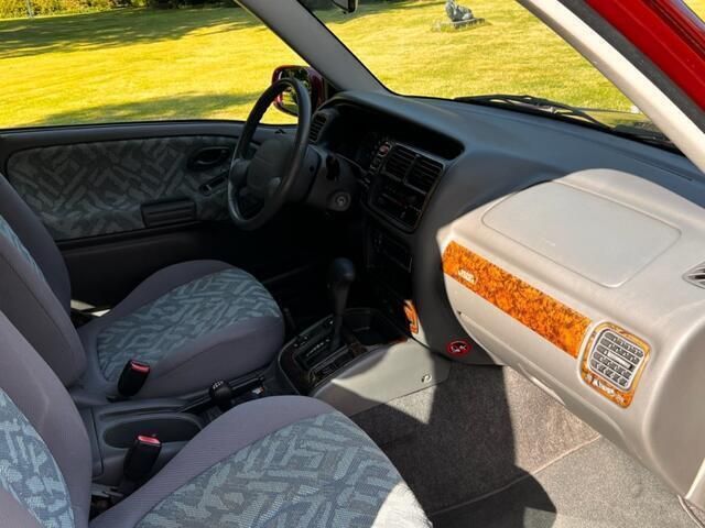 Occasion Suzuki Grand Vitara 132 PK (97 kW) 2000 Rood, metallic lak SUV