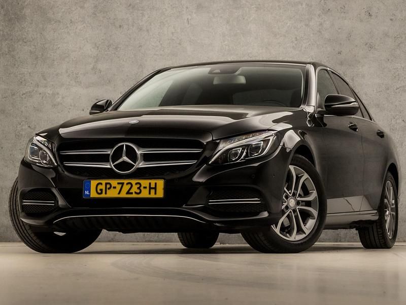 Zwart, metallic lak Gebruikt 2014 Mercedes C180 Prestige Sedan | € 17.945 (Eerlijke prijs) - Afbeelding 1/4