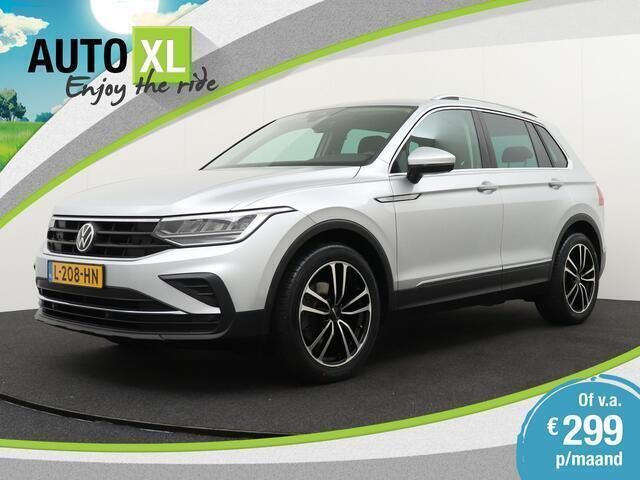 Grijs, metallic lak Gebruikt 2021 VW Tiguan Sport SUV | € 27.940 (Eerlijke prijs) - Afbeelding 1/4