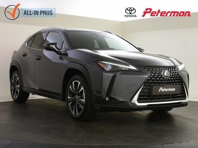 Grijs, metallic lak Gebruikt 2025 Lexus UX 300h Business Edition SUV | € 44.899 - Afbeelding 1/4