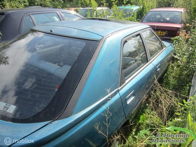 Occasion Mazda 323 90 PK (66 kW) 1991 Groen Hatchback