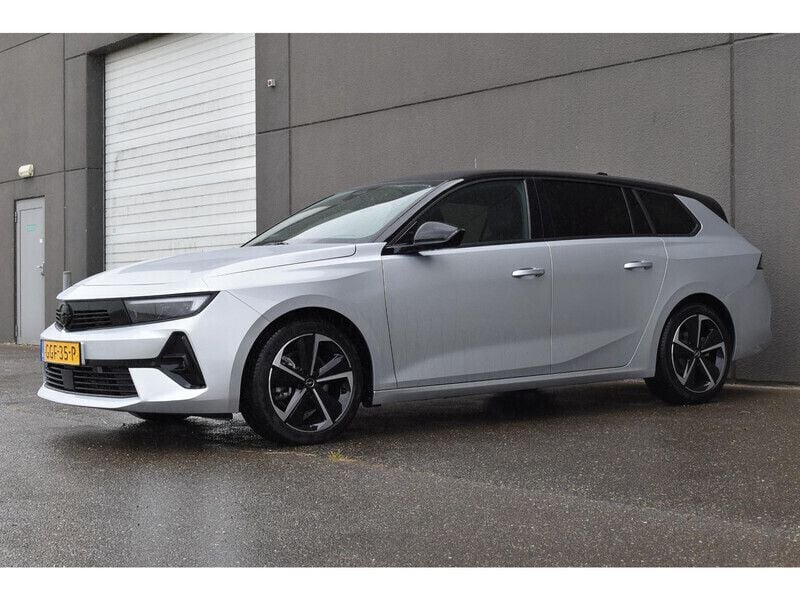 Grijs Gebruikt 2024 Opel Astra Stationwagen | € 32.940 (Eerlijke prijs) - Afbeelding 1/4