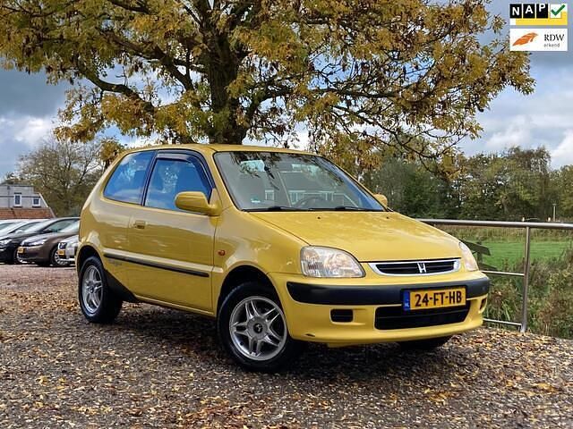 Geel Gebruikt 2000 Honda Logo Hatchback | € 1.850 - Afbeelding 1/3