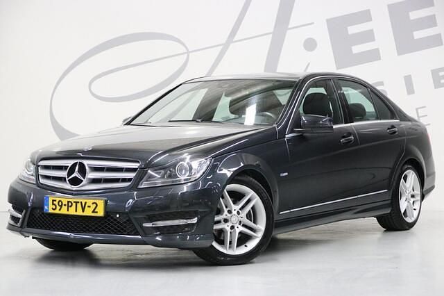 Occasion Mercedes C180 AMG line 157 PK (115 kW) 2011 Zwart Sedan