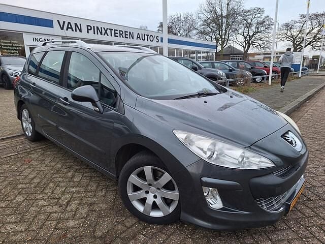 Grijs (metallic) Occasion 2009 Peugeot 308 Stationwagen | € 995 (Goede deal) - Afbeelding 1/4