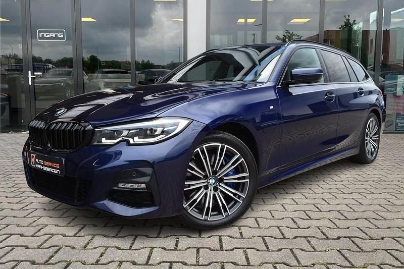 Blauw Gebruikt 2021 BMW 330e M Sport Stationwagen | € 34.900 (Eerlijke prijs) - Afbeelding 1/4