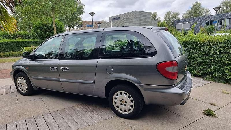 Grijs Gebruikt 2006 Chrysler Grand Voyager MPV | € 2.250 (Super prijs) - Afbeelding 1/4