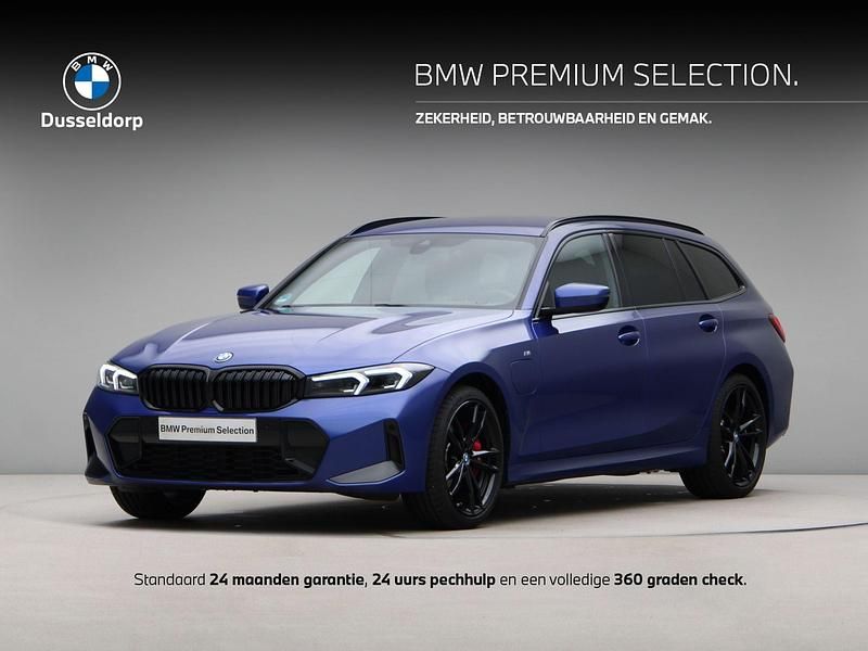 Blauw Gebruikt 2024 BMW 330e M Sport Stationwagen | € 49.450 (Super prijs) - Afbeelding 1/4